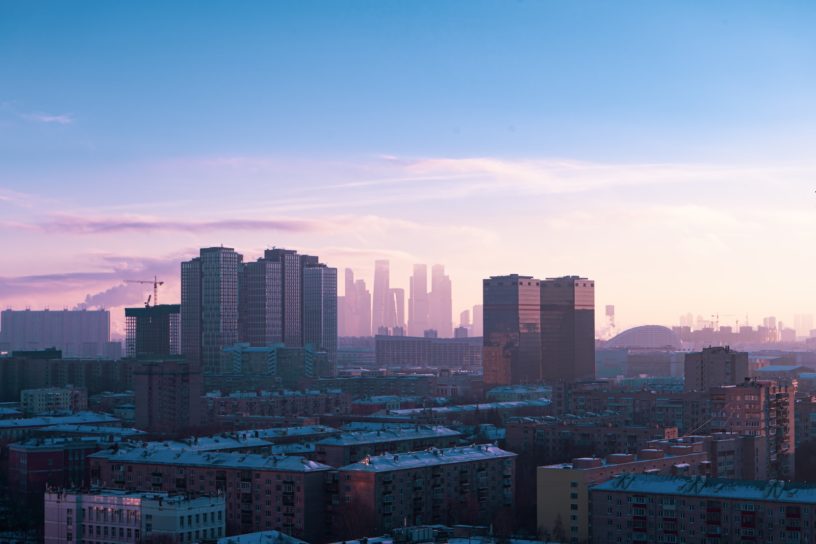 city skyline under blue sky during daytime